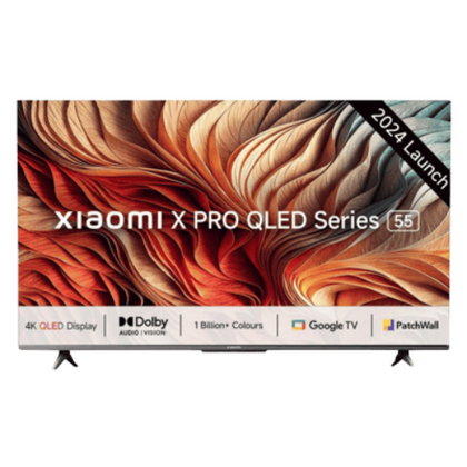 A 50-inch Xiaomi X Pro 4K Ultra HD Smart Google TV, featuring a sleek, premium metallic, bezel-less design and standing on its two separate, modern pedestal feet.