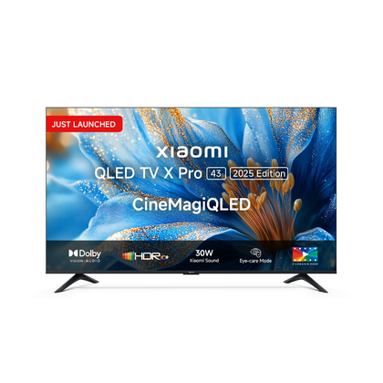 A black, 43-inch Xiaomi X Pro QLED Series 2025 Edition 4K Smart Google TV, featuring a premium metal, bezel-less design and standing on its two sleek, separated pedestal feet.