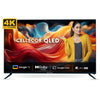 A large 65-inch Cellecor PRO 4K UHD QLED Smart TV, featuring a premium, bezel-less design and supported by its two detached table-top stand feet.