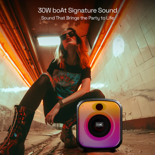 The boAt PartyPal 63 Pro is a portable Bluetooth speaker with a tall, cylindrical design, featuring a top handle, dynamic RGB light effects, and delivering 30 W of boAt Signature Sound.