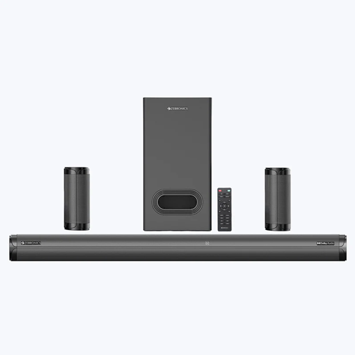 The ZEBRONICS Zeb-Juke BAR 9450 PRO is a powerful 5.1 channel soundbar system consisting of a main soundbar unit, a dedicated wired subwoofer, and two wired rear satellite speakers, delivering immersive audio enhanced with Dolby Audio technology.